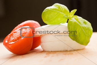 Tomatoe and Mozzarella on Cutting board