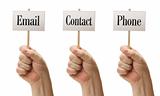 Three Signs In Male Fists Saying Email, Contact and Phone Isolated on a White Background.