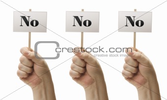 Three Signs In Male Fists Saying No, No and No Isolated on a White Background.
