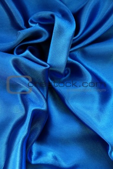 Smooth elegant blue silk as background