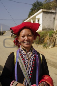 Red Hmong pompons ethnic woman portrait