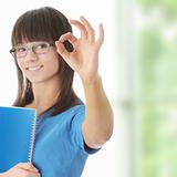 Teen student girl with note pad