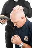 Policeman in Prayer