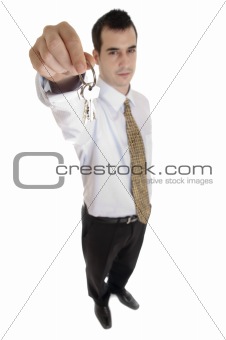 Business man showing key