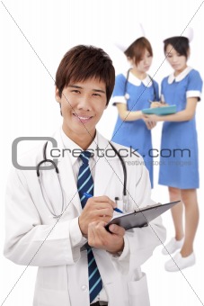 Smiling young medical doctor and nurses