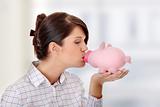 Woman Holding Piggy Bank 