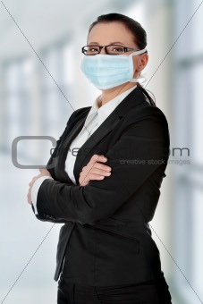Portrait of businesswoman wearing protective mask