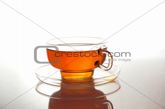 cup of tea on white with reflection