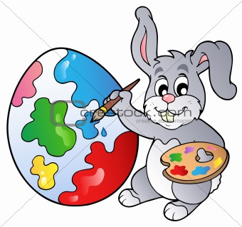 Bunny artist painting Easter egg