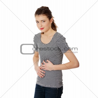 Teen woman with stomach issues