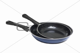 two pans isolated on white background.
