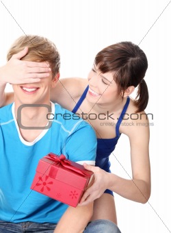 Girl give a gift to her boyfriend.