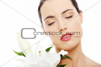 Spa woman with lily flower