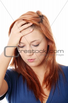 Woman with headache holding her hand to the head