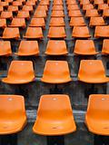 Orange seats on the stadium vertical