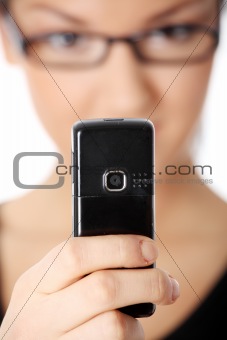 Young woman using cell phone