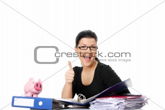 Young woman at the desk gesturing OK