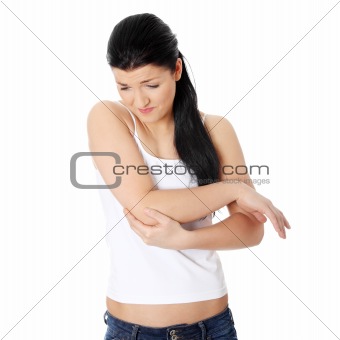 Young woman with hand pain