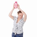Woman trying to get money from her piggy bank