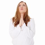 Closeup portrait of a young caucasian woman praying 