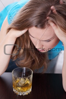 Young corpulent woman in depression
