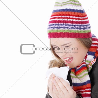 Sneezing woman with handkerchief