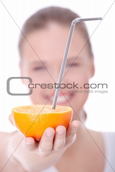 Young caucasian woman with orange