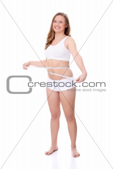 Female measuring her body