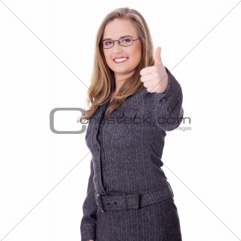 Businesswoman standing with thumb up
