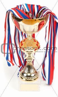 Golden cup, medals with tape
