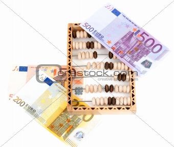 Wooden abacus and bills euro