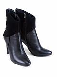 Black feminine leather boots with suede insertion