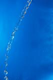beautiful water splash on blue