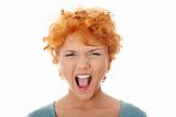 Furiouse young redhead woman screaming.