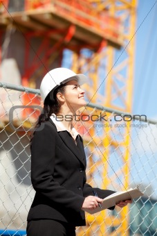 Woman looking at construction site