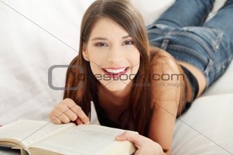Beautiful woman reading a book