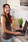 Young beautiful woman with laptop