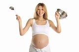 happy pregnant woman with cooking utensils