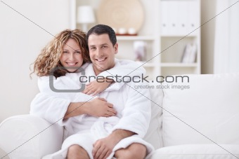 Embracing couple at home