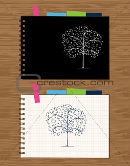 Notebook cover and page design on wooden background 