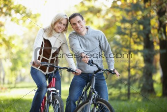 Attractive couple on bikes