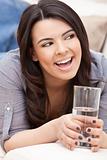 Hispanic Woman Laughing Drinking Glass of Water