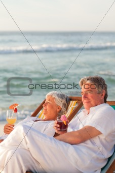 Retired couple drinking a cocktail