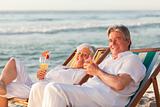 Retired couple drinking a cocktail