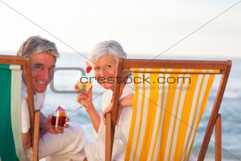 Senior couple drinking a cocktail