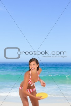 Woman playing frisbee