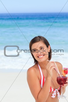 Lovely woman drinking a cocktail