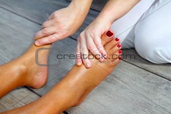 Reflexology woman feet massage therapy