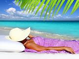 Caribbean tourist resting beach hat woman
