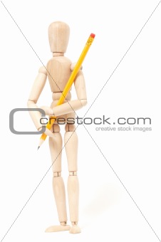 wooden puppet holding pencil
